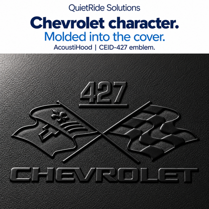 AcoustiHood CEID-427 emblem detail illustration showing the offered artwork as black molded relief on rigid leather-grain ABS. Generated, not a macro photograph of a manufactured part; texture, relief, scale and placement are illustrative estimates.
